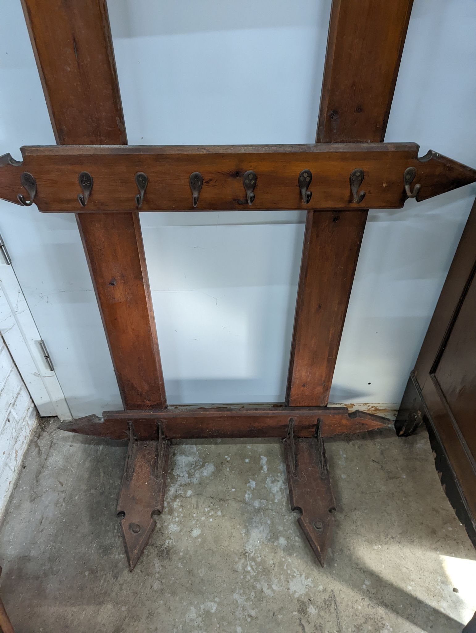 A late Victorian pitch pine hall stand, width 98cm, height 240cm